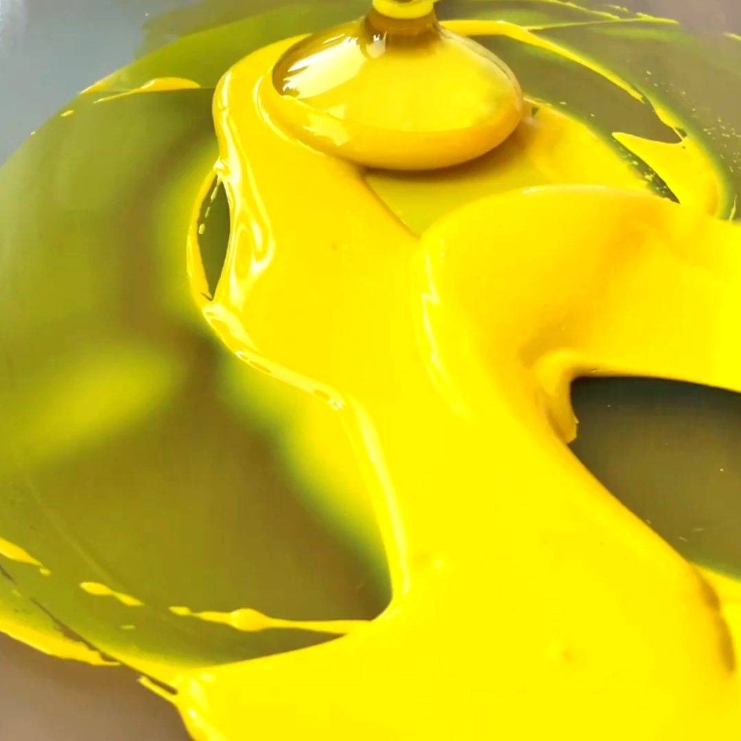 High-viscosity bright yellow watercolor pigment paste poured during binder formulation by VHacademy