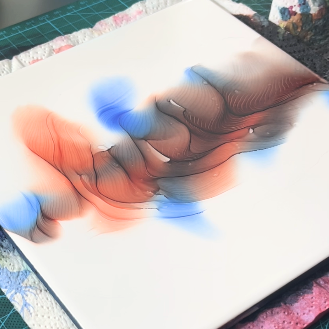 High-contrast composition of bright ultramarine blue and soft coral alcohol ink diffusion bands by VHacademy
