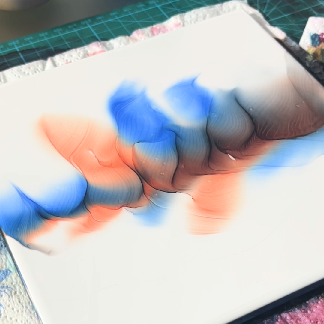 High-contrast composition of bright ultramarine blue and soft coral alcohol ink diffusion bands by VHacademy