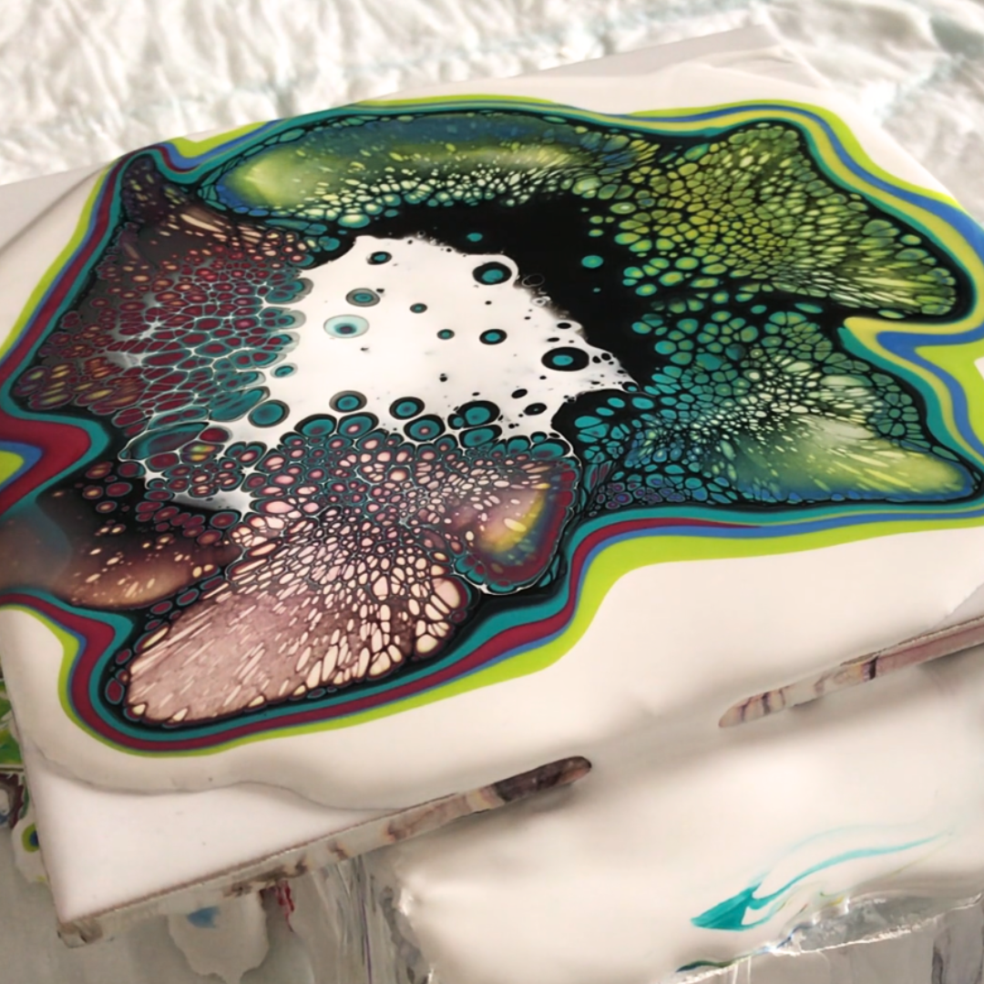Experimental acrylic pour tile showing dense white cellular dispersion over deep green and black base by VHacademy