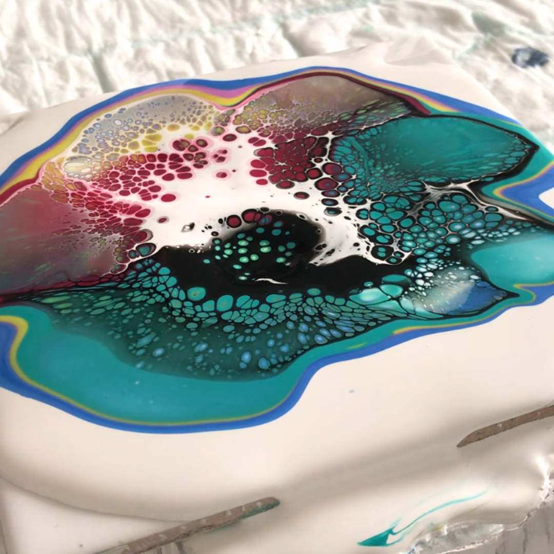 Close-up of deep teal blue and burgundy fluid acrylic pour showing high-contrast cell formation by VHacademy