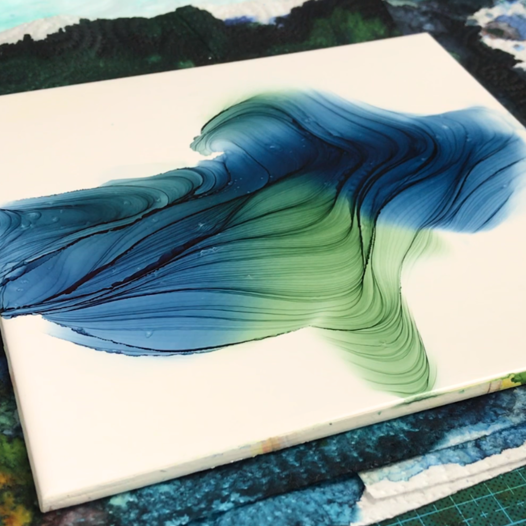 Broad sweeping motion of deep teal blue and emerald green alcohol ink displaying intricate ridge patterns by VHacademy