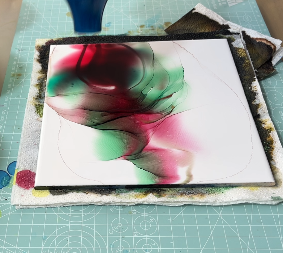 Controlled ink distribution and localized color movement on square panel guided by deliberate human intervention by VHacademy